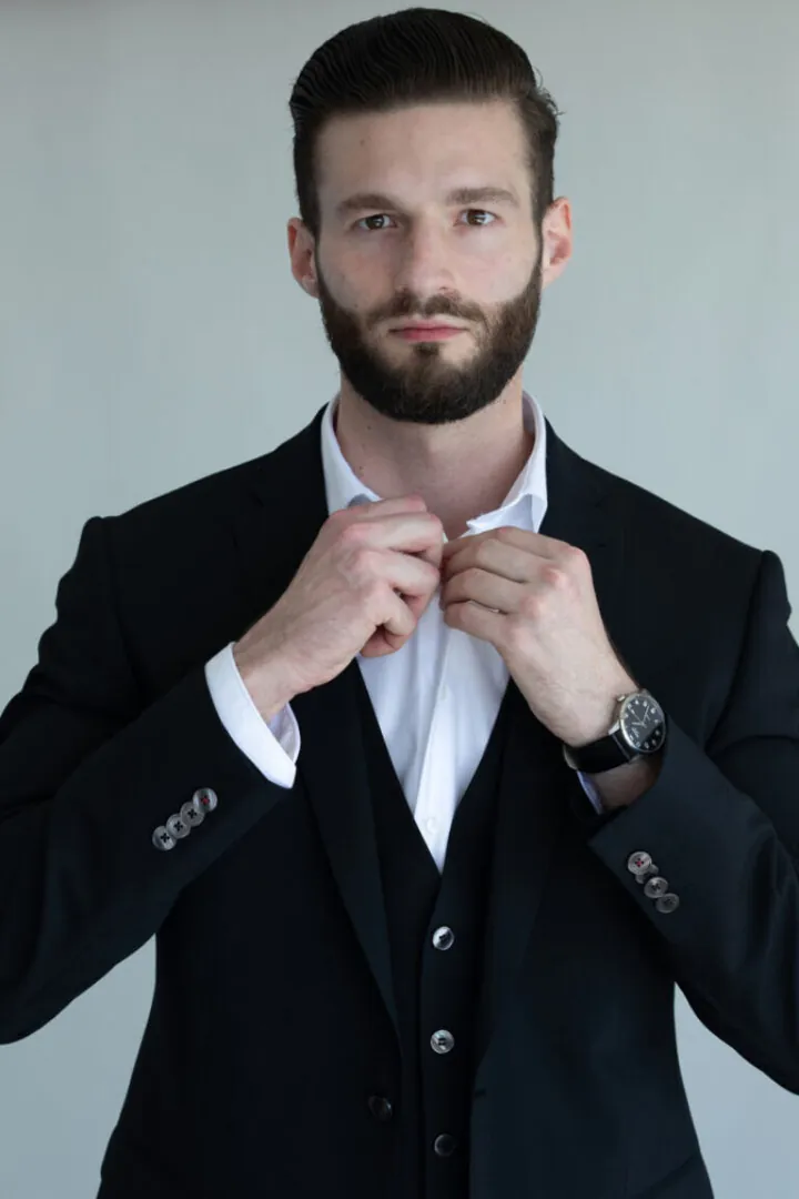 Alexander W.